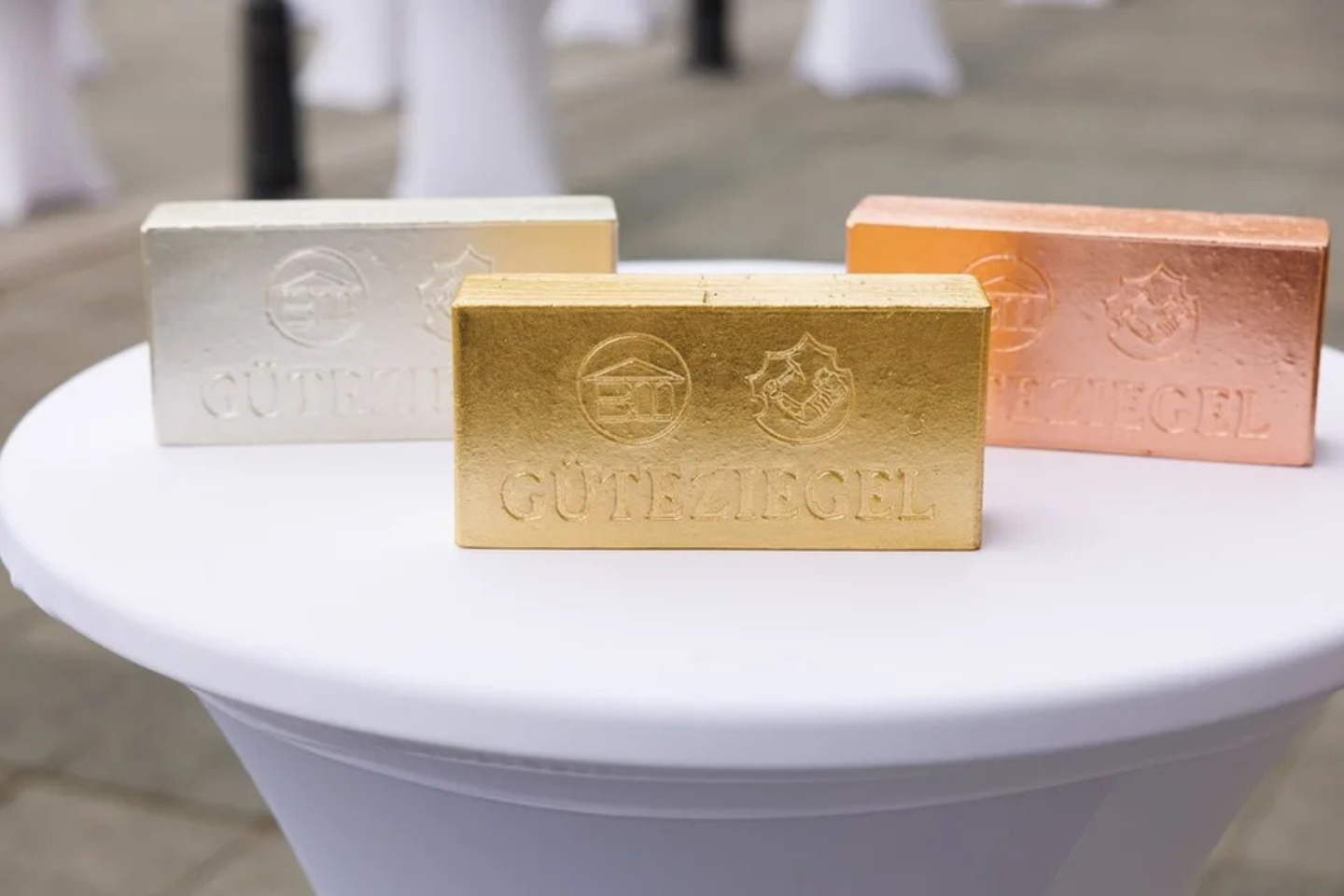 Der Güteziegel in Gold, Silber und Bronze